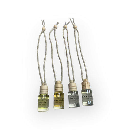 5 aroma diffusers on a white background