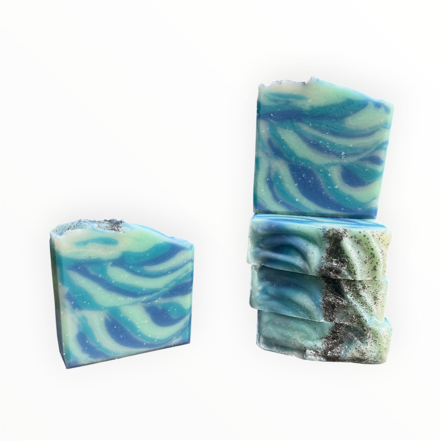 Five swirled blue soap bars on a white background