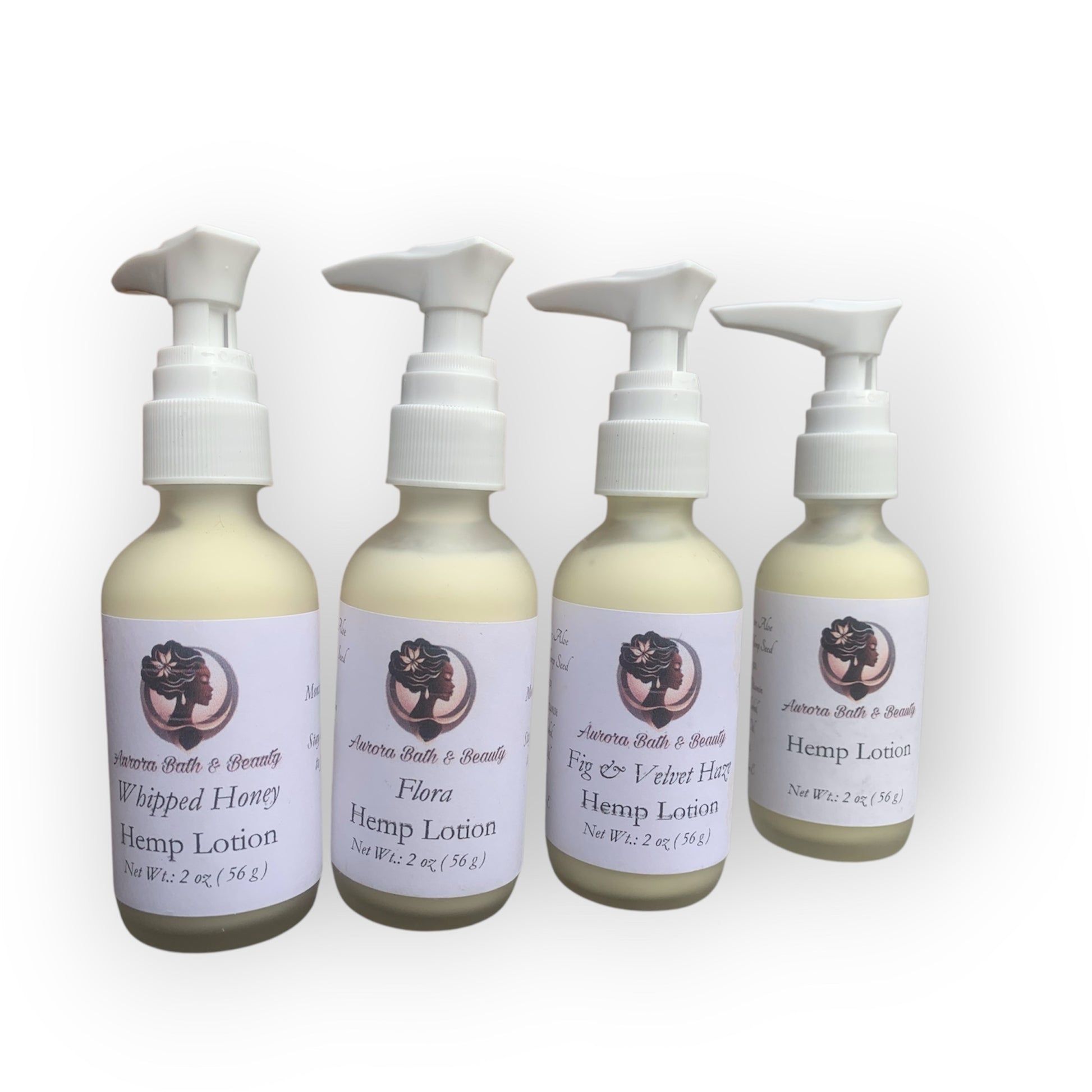 Four bottles of hemp lotion with labels on a white background