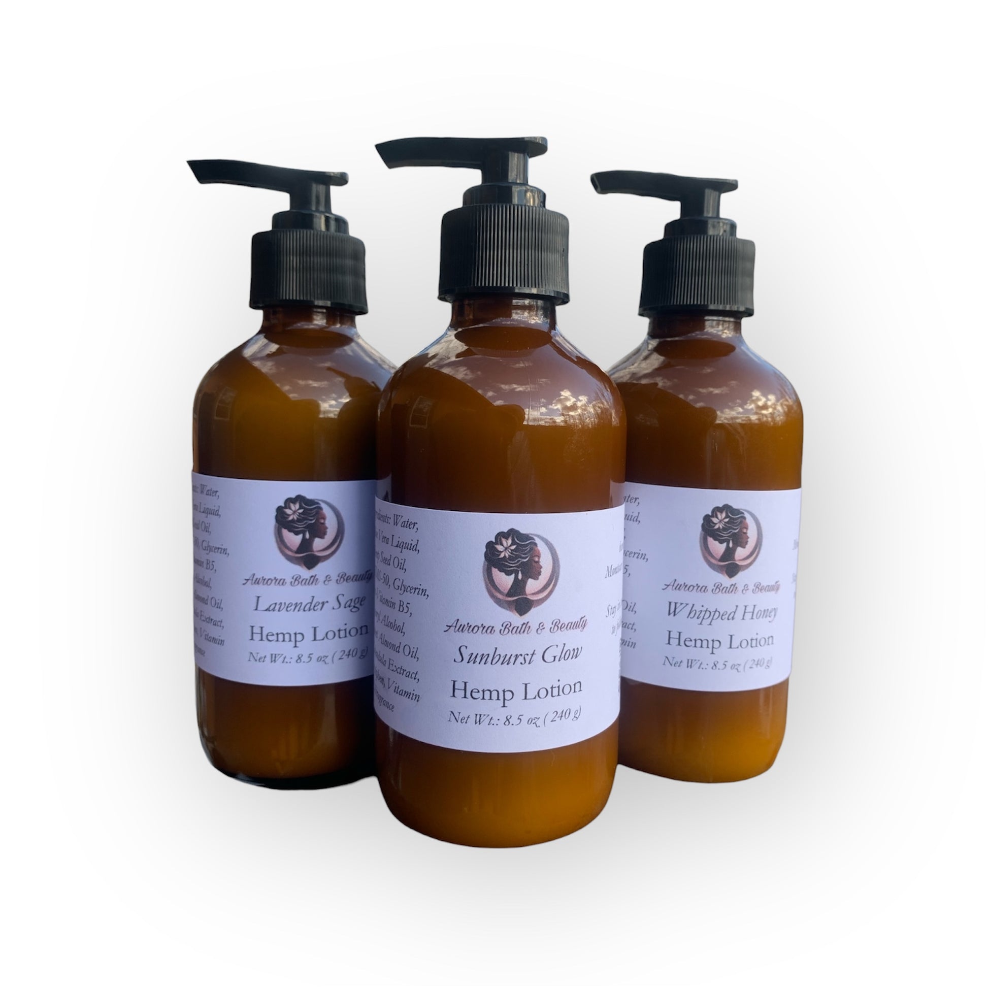 Three bottles of hemp lotion with pump dispensers on a white background