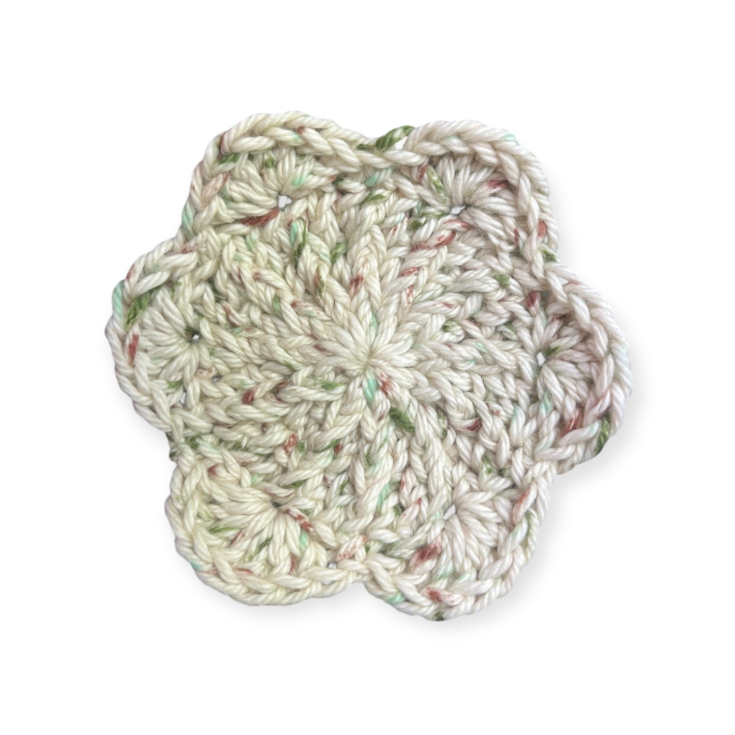 Beige and natural tones crocheted cloth on a white background