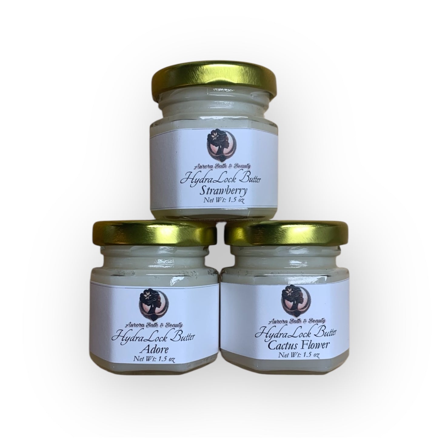 Three jars of HydraLock Butter in different sizes with white labels that include the product name and a brief description.